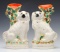 A PAIR 19TH CENT STAFFORDSHIRE POTTERY SPANIELS