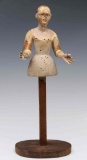 AN 18TH CENTURY FRENCH DRESS MAKER'S DOLL