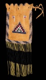 A FORT SILL APACHE BEADED HIDE BACK