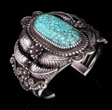 A STRIKING KIRK SMITH TURQUOISE FEATHER BRACELET