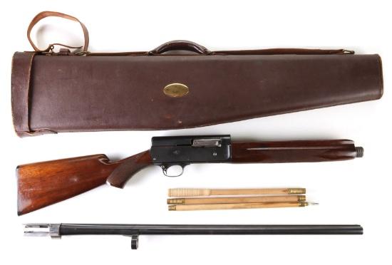 A REMINGTON MODEL 11 AUTOMATIC 20 GAUGE SHOTGUN