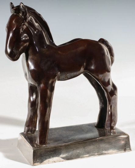 AN ART DECO BRONZE PONY ON SILVERED BASE
