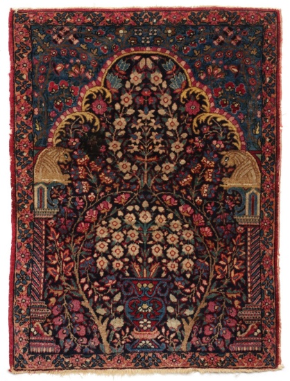 A PERSIAN SEMI-ANTIQUE PRAYER RUG WITH