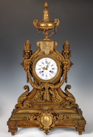 A 19TH CENTURY FRENCH BRONZE CLOCK SIGNED LEVY PARIS