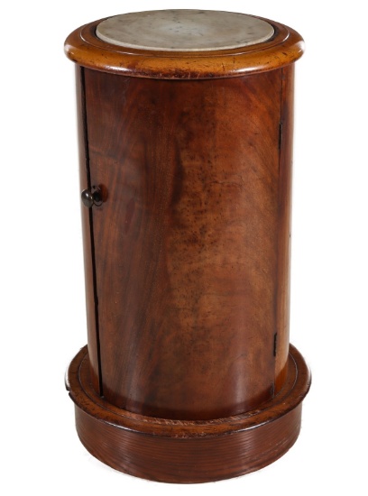 AN EDWARDIAN CYLINDRICAL MARBLE TOP CHAMBER POT CABINET