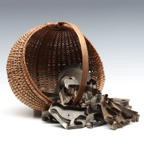 A GOOD ANTIQUE BUTTOCKS BASKET WITH EYE OF GOD WEAVE