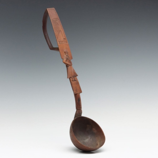 A 19TH C. SCANDINAVIAN CARVED WOOD SPOON WITH FIGURE