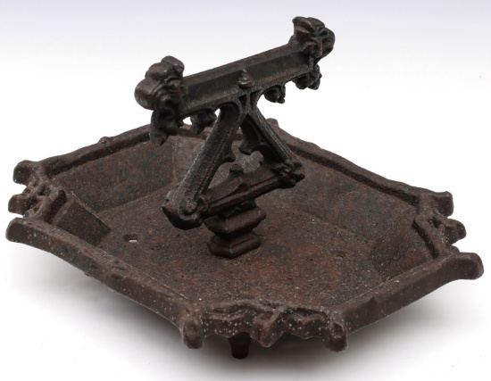A PRE-1885 GOTHIC INFLUENCE CAST IRON BOOT SCRAPER