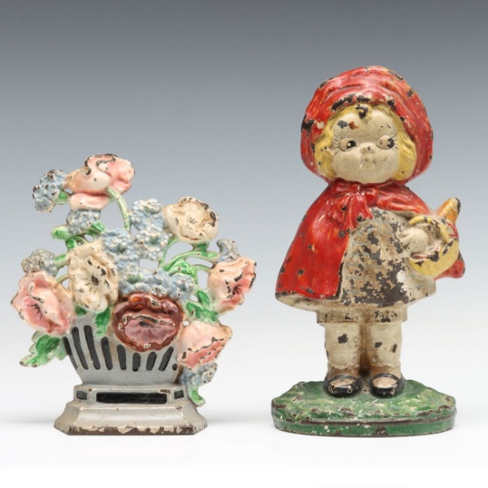 TWO HUBLEY CAST IRON DOORSTOPS