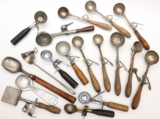 A COLLECTION OF SIXTEEN ANTIQUE ICE CREAM SCOOPS