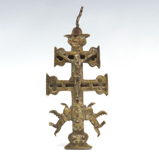AN 18TH CENTURY SPANISH BRASS CROSS OF CARAVACA