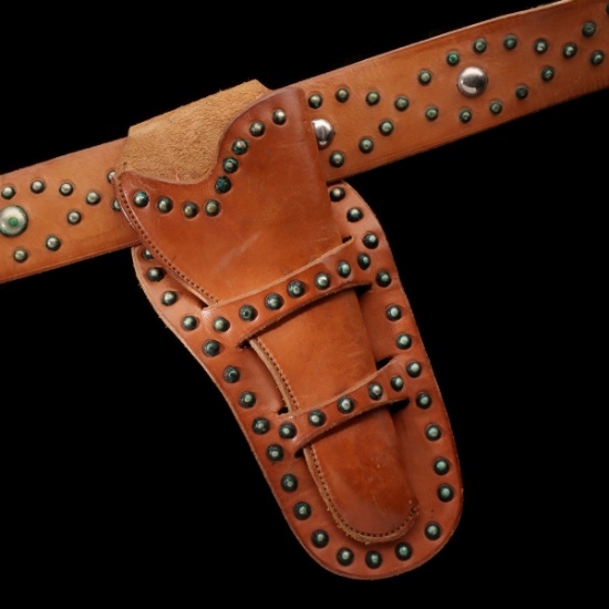 A STUDDED LEATHER GUN HOLSTER AND BELT SIGNED SHIPLEY