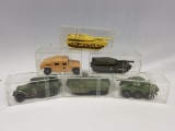 Six Assorted Military Matchbox Style Vehicles in clear plastic display cases (MGN)