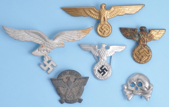 Five German Nazi WWII Visor Hat Insignia and a Police Tinnie (A)