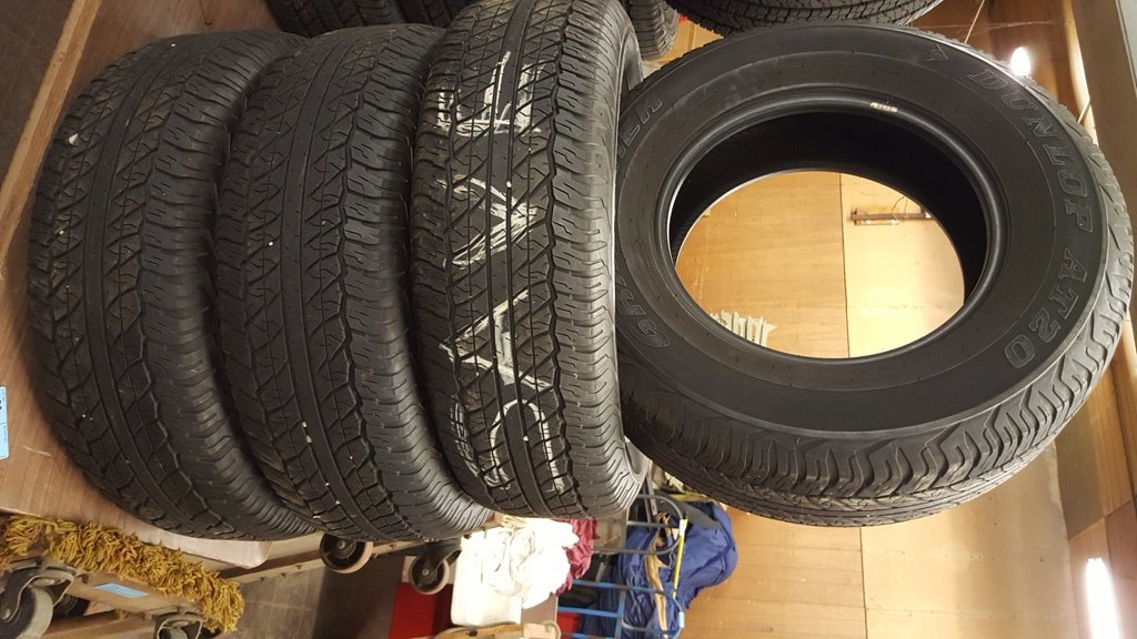 4 DUNLAP GRANDTREK AT20 P265/70R17 TRUCK TIRES (LESS THAN 5K MILES)