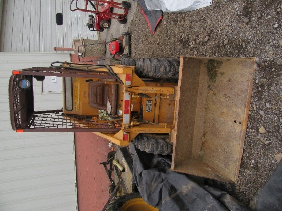 CASE 1816 C SKID STEER WITH EXTRA 47 INCH BUCKET, AND 5 FOOT PUSH BLADE.