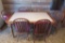 APPROXIMATELY 5 FOOT BY 3 FOOT WOODEN AND CERAMIC TILE TABLE WITH 6 CHAIRS