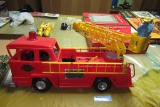 LOUIS MARX ELECTRIC FIRE ENGINE WITH FIGURINES. ONE IS MISSING HELMET