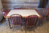 APPROXIMATELY 5 FOOT BY 3 FOOT WOODEN AND CERAMIC TILE TABLE WITH 6 CHAIRS