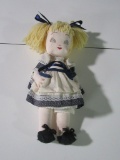 CLOTH DOLL WITH EMBROIDERED FACE