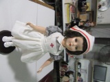 NURSE VINYL DOLL WITH STAND. NO MARKINGS