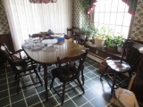 HEAVY DARK WOOD KITCHEN TABLE WITH 6 CHAIRS. ONE HOST CHAIR
