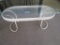 GLASS TOP OVAL COFFEE TABLE