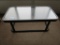 GLASS TOP METAL BASE COFFEE TABLE