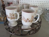 5 DECORATIVE MUGS ON METAL LAZY SUSAN