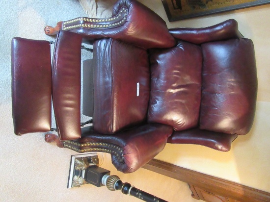 BURGUNDY LEATHER RECLINER WITH DECORATIVE CLAW FEET