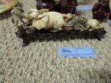 CARVED FIGURINE OF LIONS ATTACKING ELEPHANT