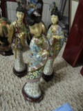 3 ORIENTAL FIGURINES ON DISPLAY