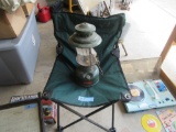 CAMP STOOL WITH COLEMAN LANTERN. GLASS BROKEN IN LANTERN