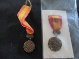 2 FOREIGN MEDALS