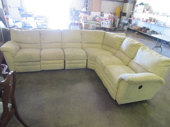 LIGHT-COLORED THREE PIECE SECTIONAL SOFA