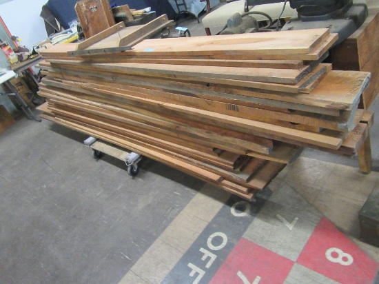 ASSORTED SIZE ROUGH CUT AND FINISHED CHERRY WOOD. FOUR-WHEEL DOLLY NOT INCL