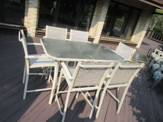 TALLER PATIO SET 6 CHAIRS AND TABLE APPROXIMATELY 5 FT BY 3 FT AND 34 INCHE