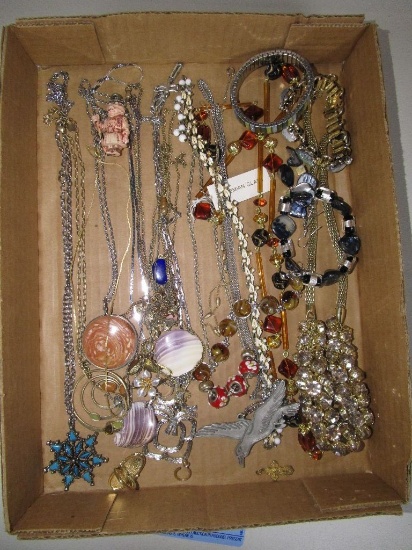 ASSORTMENT OF COSTUME JEWELRY INCLUDING NECKLACES, BRACELETS, AND ETC