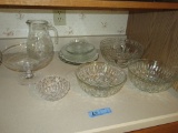 VARIETY OF GLASSWARE - BOWLS, PLATES, PITCHER, COMPOTE, AND ETC