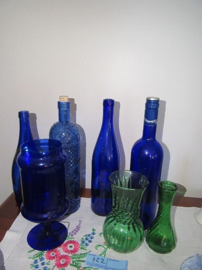 ASSORTED BLUE GLASS BOTTLES. GREEN VASES
