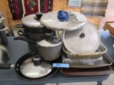 ASSORTED POTS AND PANS AND LIDS AND BAKING DISHES