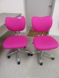 PAIR OF FUCHSIA ROLLING ADJUSTABLE CHAIRS