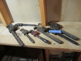 SHELF LOT OF PIPE WRENCHES