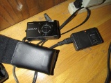 NIKON COOLPIX CAMERA WITH CASE AND BATTERY CHARGER