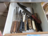 KNIVES AND UTENSILS IN THREE DRAWERS