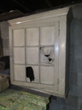 PAINTED WALL CABINET IN BASEMENT
