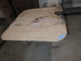 PAINTED DROP LEAF TABLE IN BASEMENT