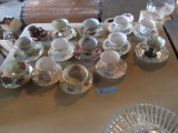 ASSORTMENT OF CUPS AND SAUCERS