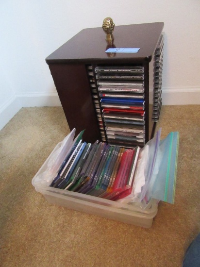 VARIETY OF CDS AND WOODEN CD HOLDER