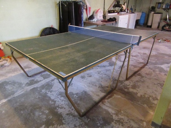 PING PONG TABLE IN BASEMENT